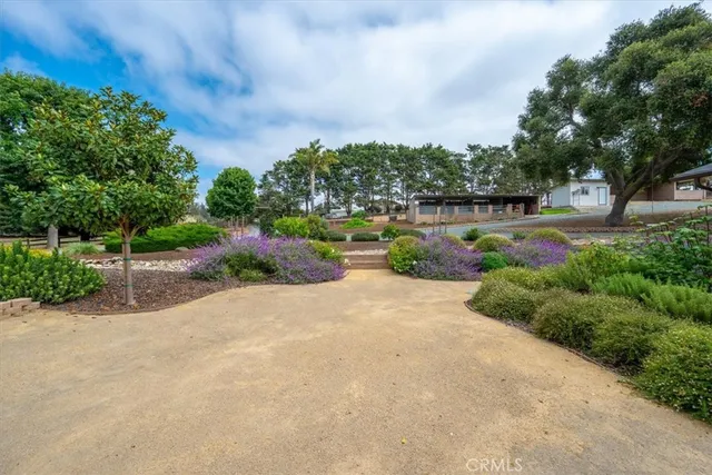 a view of a balcony with a floor to ceiling window and outdoor space