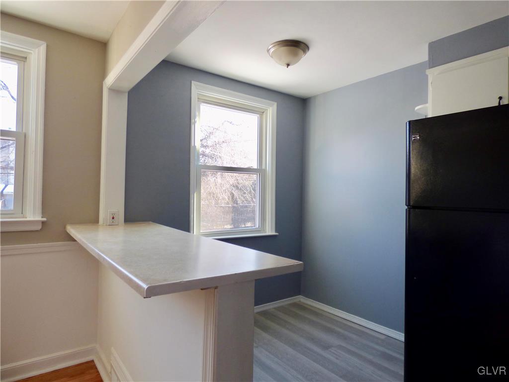 1925 South Delaware Street Allentown, PA 18103 - Photo 7 of 16 a view of kitchen with wooden floor and window