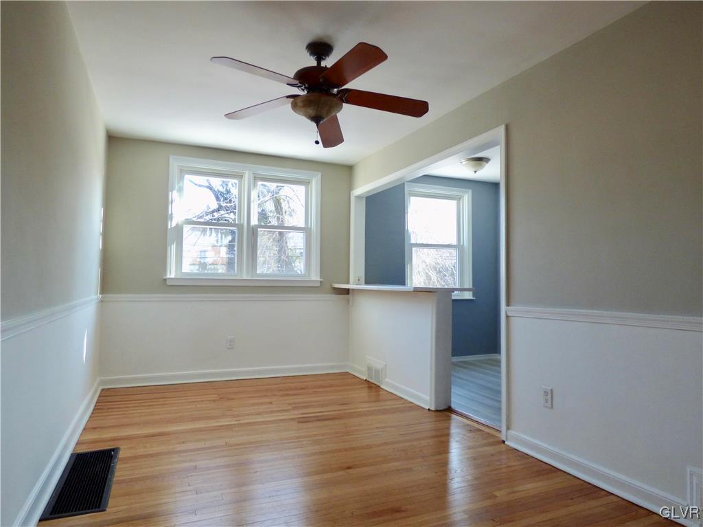 1925 South Delaware Street Allentown, PA 18103 - Photo 8 of 16 a view of empty room with wooden floor and fan