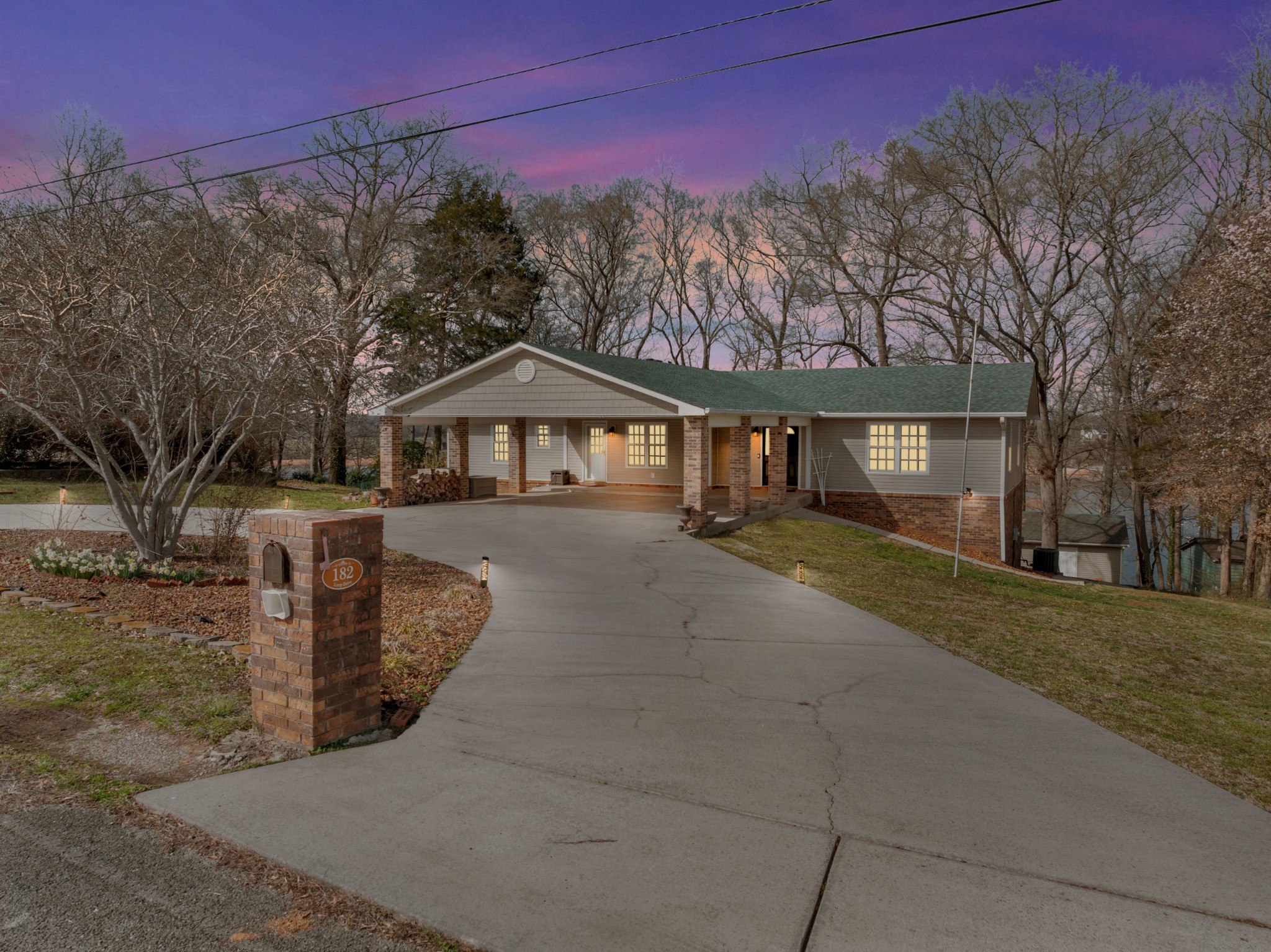 182 Loop Drive Winchester, TN 37398 - Photo 1 of 60 a front view of a house with a yard and garage