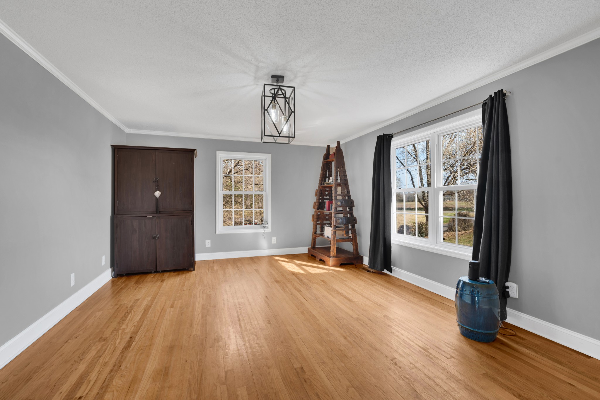 182 Loop Drive Winchester, TN 37398 - Photo 7 of 60 a view of a big room with wooden floor staircase and windows