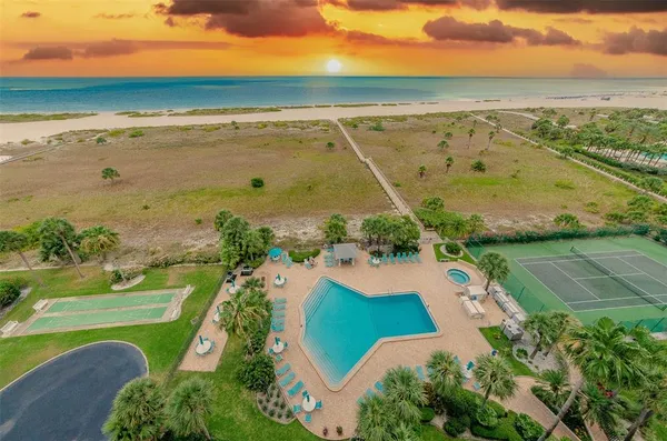 an aerial view of beach and ocean