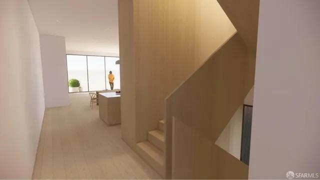 a view of staircase with white walls