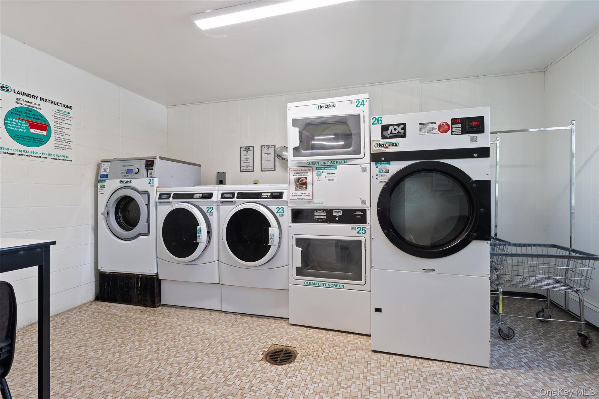 1840 Crompond Road, Unit 5C2 Peekskill, NY 10566 - Photo 20 of 27 a utility room with dryer and washer