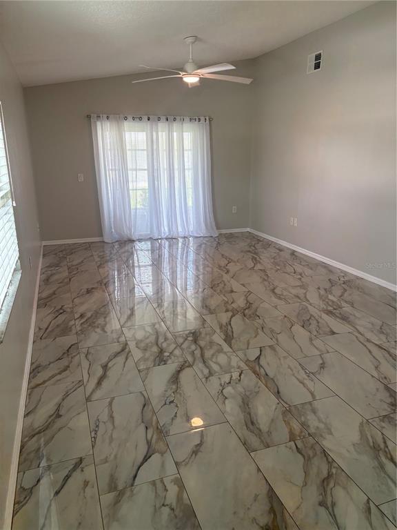 9221 Estrada Place New Port Richey, FL 34655 - Photo 3 of 16