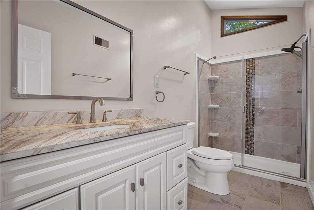 142 Riding Trail Lane Pittsburgh, PA 15215 - Photo 29 of 49 Newly renovated hall bath with stylish modern finishes.