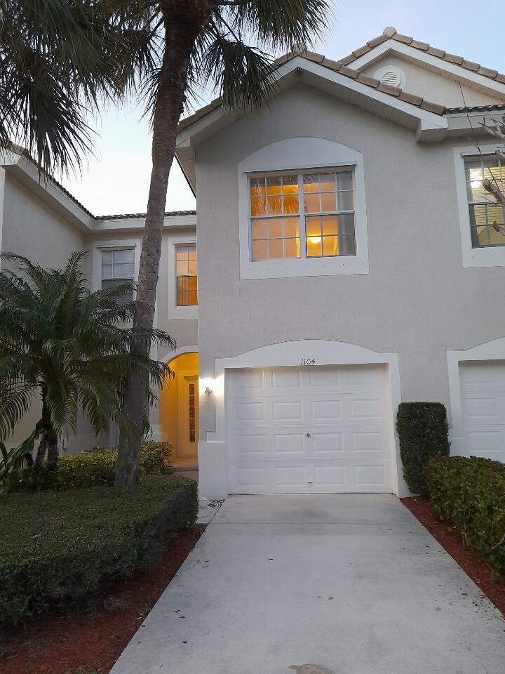 1104 Woodfield Road Greenacres, FL 33415 - Photo 1 of 11 front