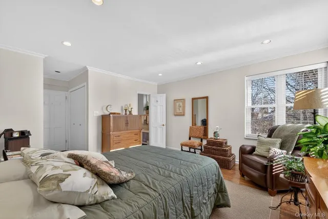 a bedroom with a bed and furniture