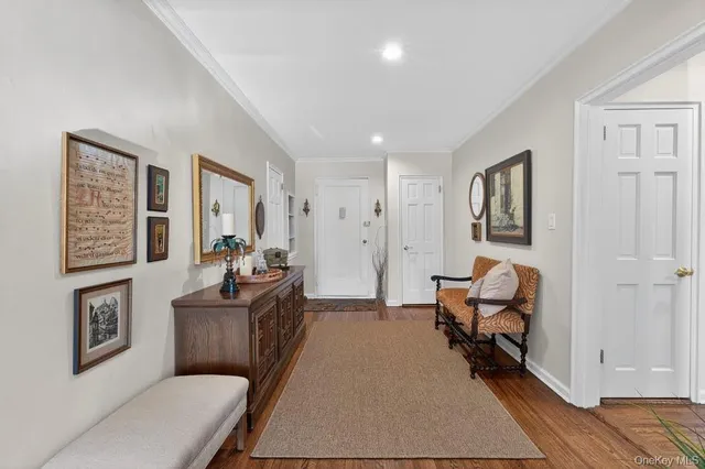 a living room with furniture and a rug