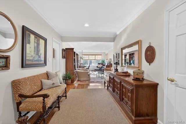 a living room with furniture and a stove