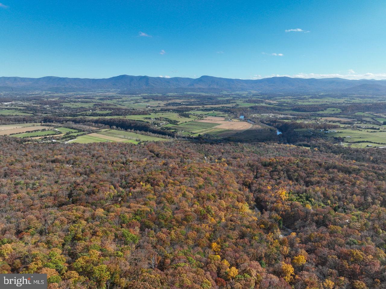 187 Holly Hl Road Luray, VA 22835 - Photo 21 of 60 a view of a lake with mountains in the background