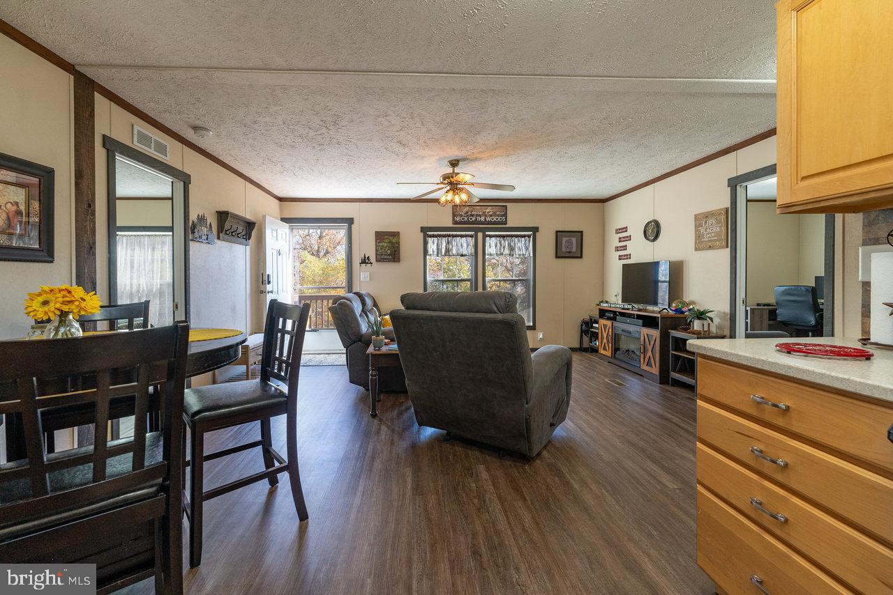 187 Holly Hl Road Luray, VA 22835 - Photo 29 of 60 a living room with furniture and wooden floor