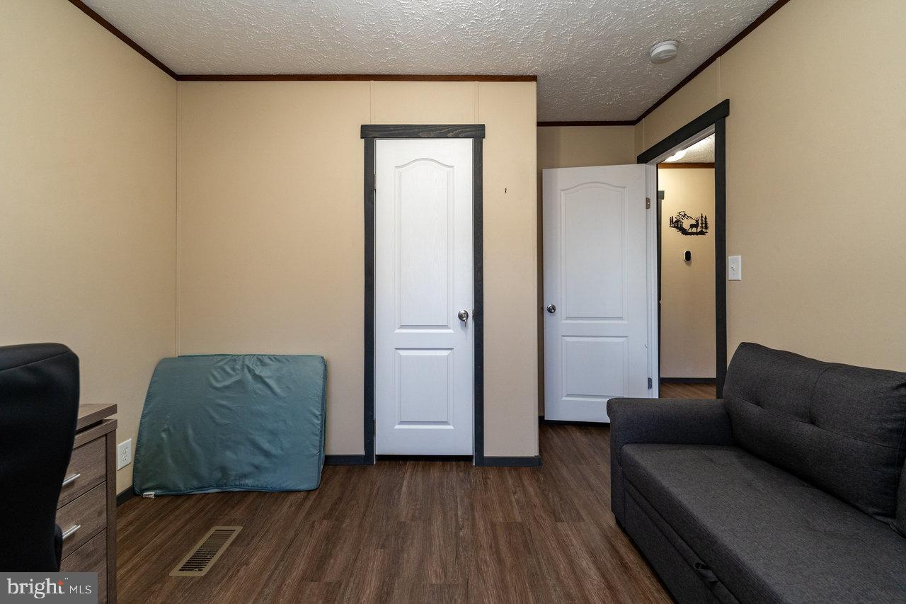 187 Holly Hl Road Luray, VA 22835 - Photo 36 of 60 a living room with furniture and a couch