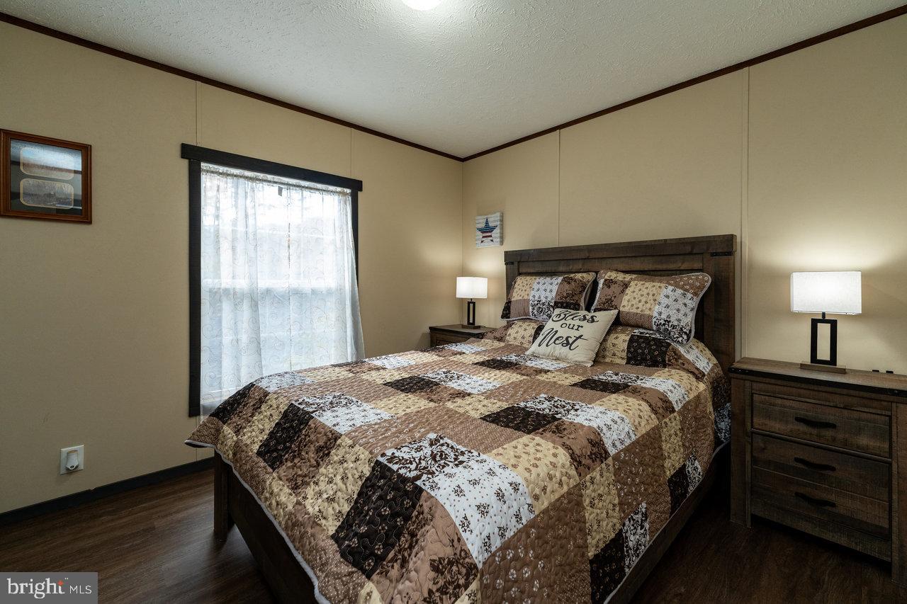 187 Holly Hl Road Luray, VA 22835 - Photo 39 of 60 a bedroom with a bed and a window