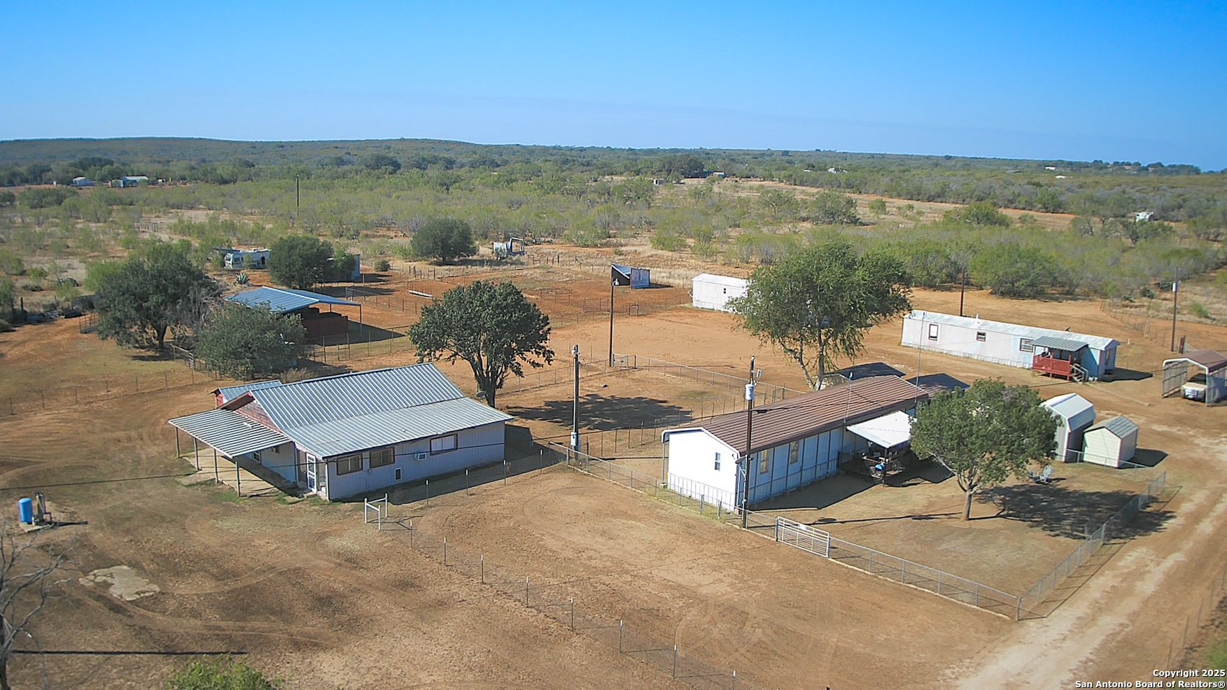 179 Private Road 6624 Devine, TX 78016 - Photo 19 of 20 an aerial view of a house with a yard and ocean view