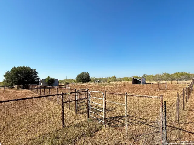a view of a terrace with chairs