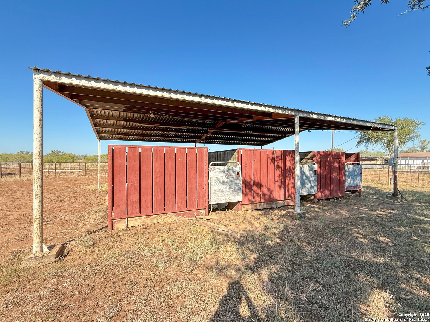 179 Private Road 6624 Devine, TX 78016 - Photo 8 of 20 a view of a backyard of the house