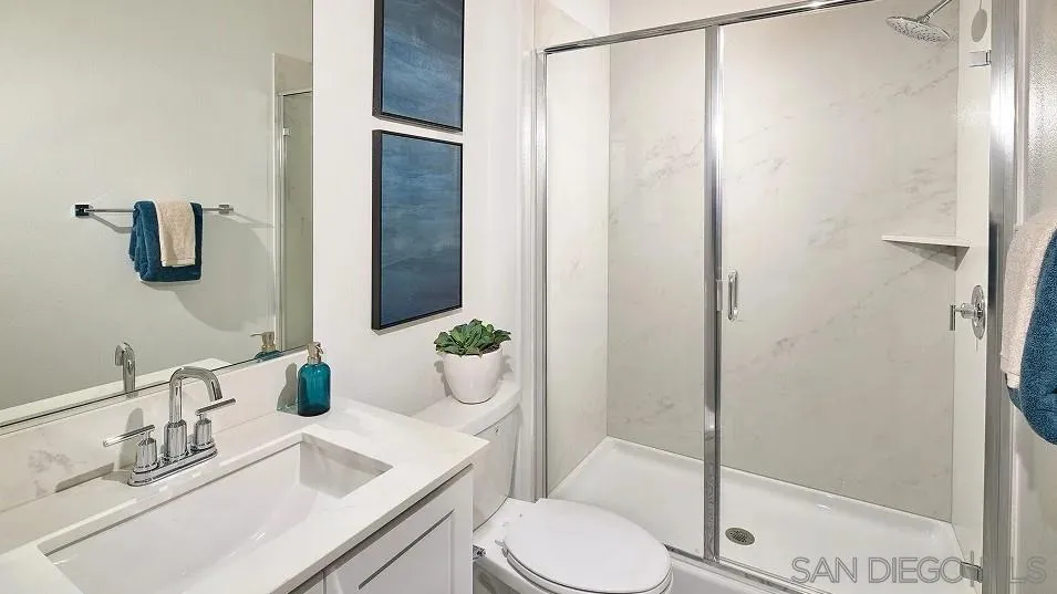 130 Mellano Way Oceanside, CA 92057 - Photo 14 of 26 a bathroom with a sink toilet and shower