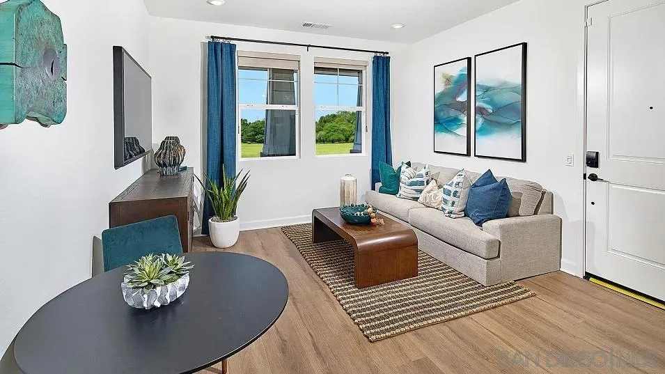 130 Mellano Way Oceanside, CA 92057 - Photo 16 of 26 a living room with furniture rug and window