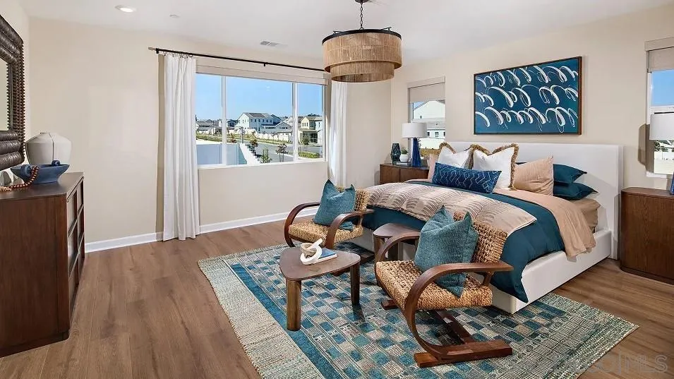 130 Mellano Way Oceanside, CA 92057 - Photo 19 of 26 a bedroom with furniture and wooden floor