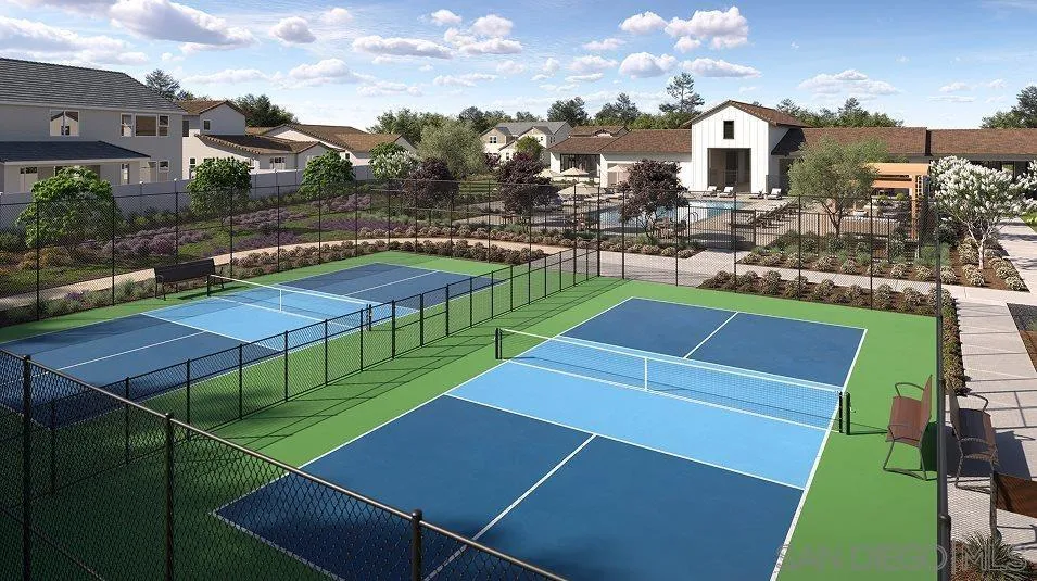 130 Mellano Way Oceanside, CA 92057 - Photo 22 of 26 a view of a tennis ground with large trees