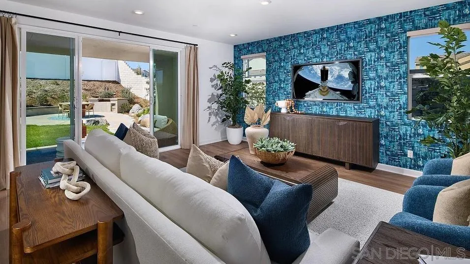 130 Mellano Way Oceanside, CA 92057 - Photo 6 of 26 a living room with furniture and a large window