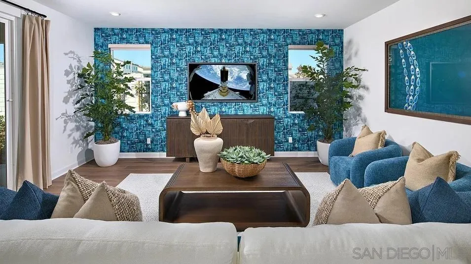 130 Mellano Way Oceanside, CA 92057 - Photo 7 of 26 a living room with furniture and a potted plant