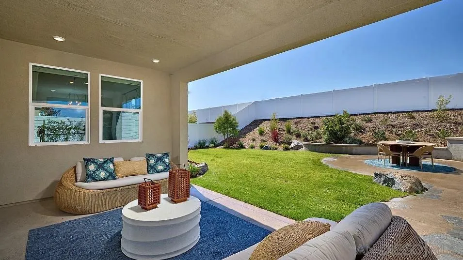 130 Mellano Way Oceanside, CA 92057 - Photo 9 of 26 a living room with furniture and a garden