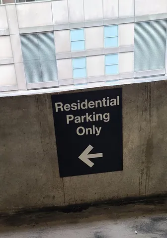 a black refrigerator freezer sitting inside of a kitchen