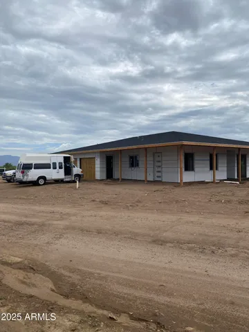a view of car parked in front of house