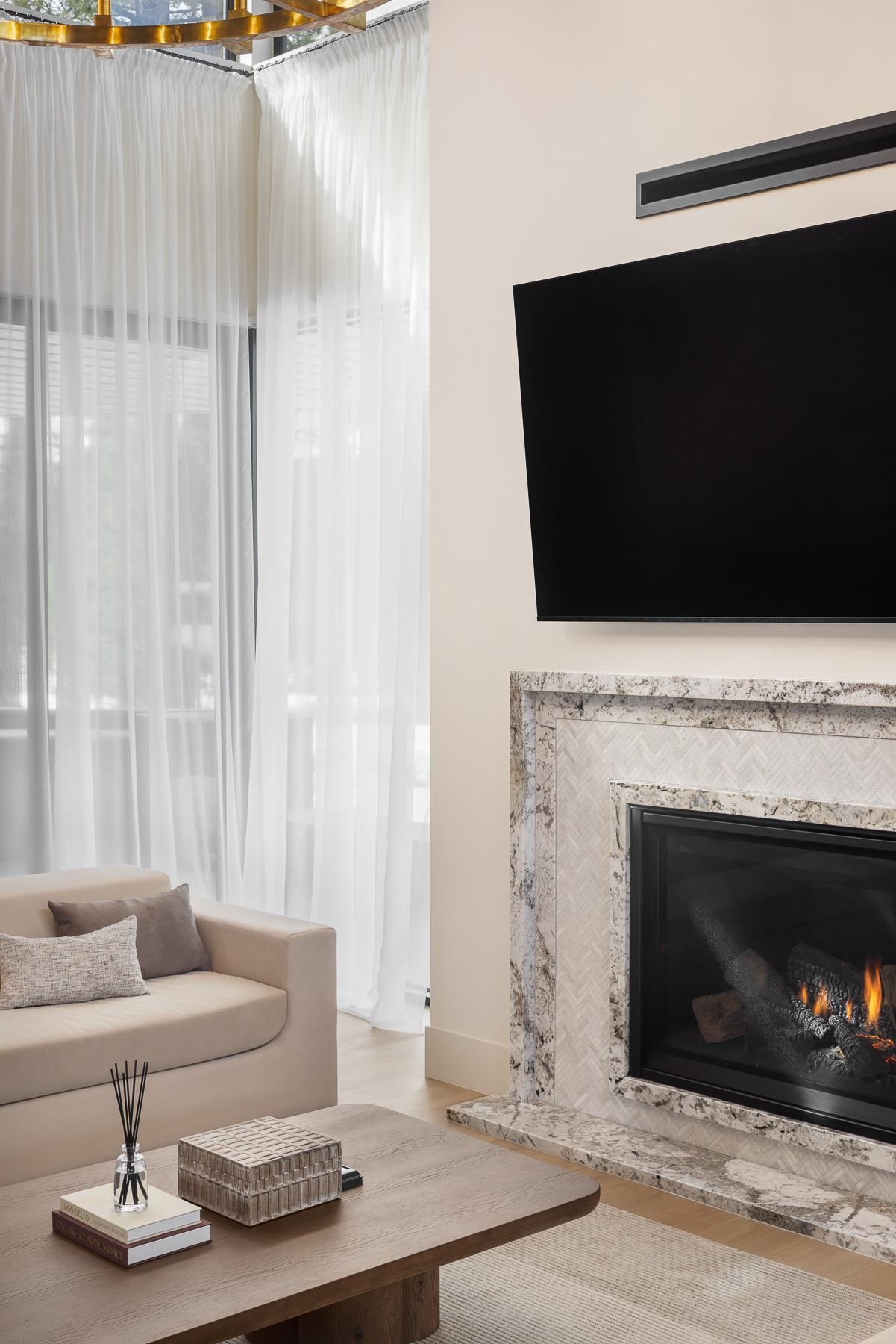11633 Henness Road Truckee, CA 96161 - Photo 7 of 26 a living room with furniture and a fireplace