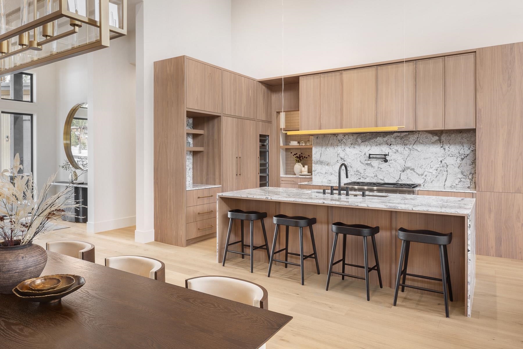 11633 Henness Road Truckee, CA 96161 - Photo 10 of 26 a kitchen with a table chairs stove and cabinets