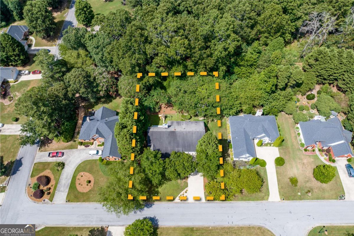2249 Cluster Lane Grayson, GA 30017 - Photo 42 of 53 an aerial view of residential houses with outdoor space