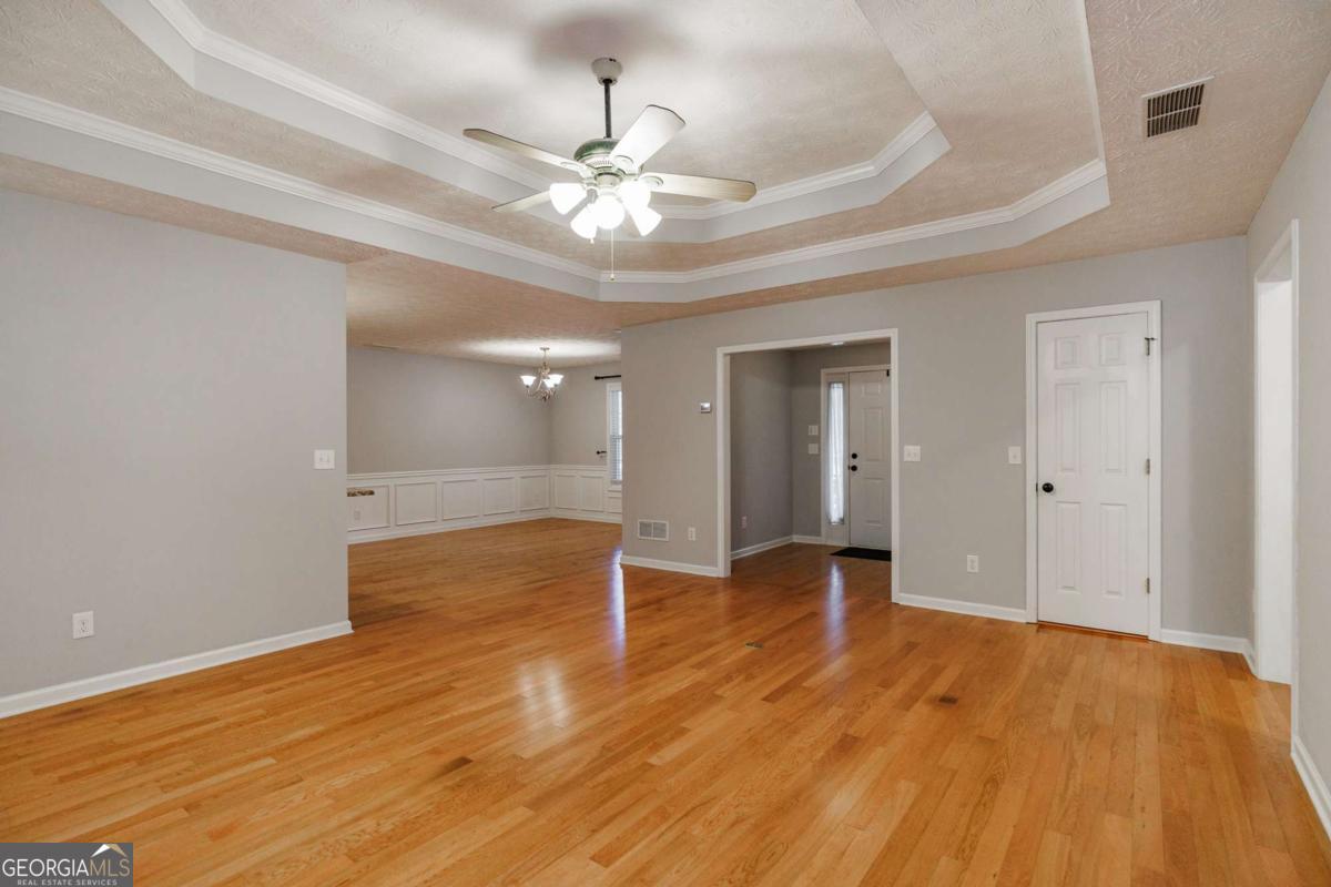 2249 Cluster Lane Grayson, GA 30017 - Photo 7 of 53 a view of an empty room and wooden floor