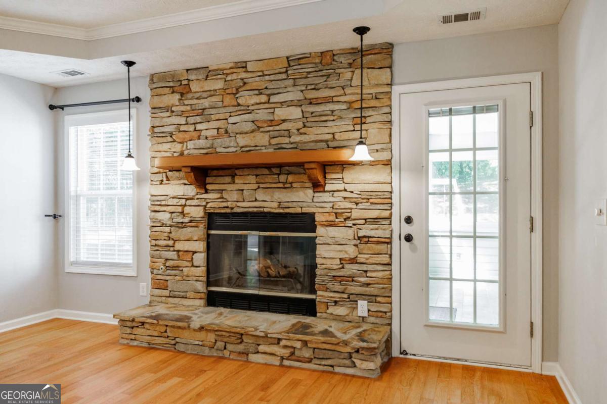 2249 Cluster Lane Grayson, GA 30017 - Photo 9 of 53 a living room with furniture and a fireplace