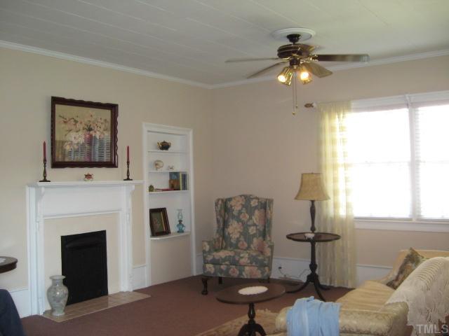 123700 School House Road Middlesex, NC 27557 - Photo 3 of 12 Charming Living room, built in shelving.