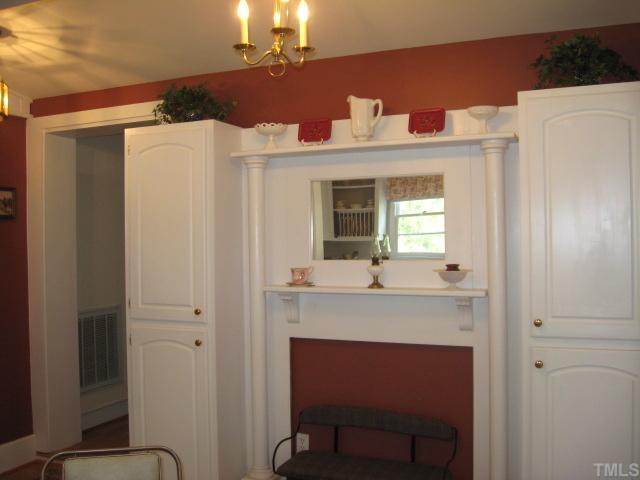 123700 School House Road Middlesex, NC 27557 - Photo 10 of 12 The other side of the kitchen, built in cabinets, space is stubbed for gas logs,