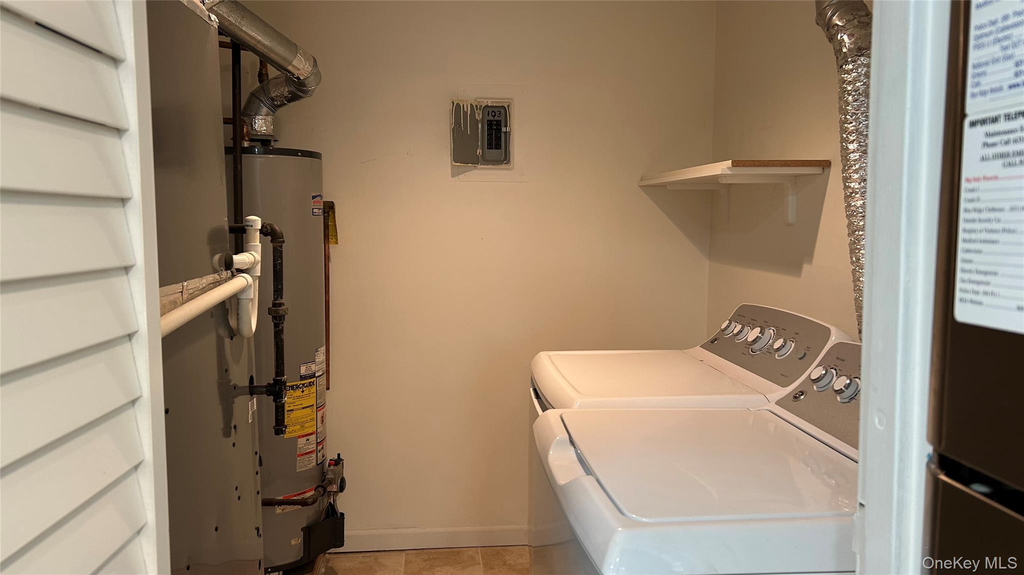 103 Birchwood Road, Unit 103 Medford, NY 11763 - Photo 6 of 13 a utility room with dryer and washer
