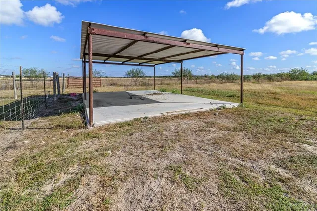 a view of patio with a slide