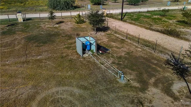 a view of a balcony with wooden floor