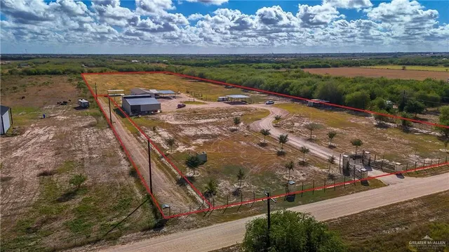 an aerial view of residential building and ocean