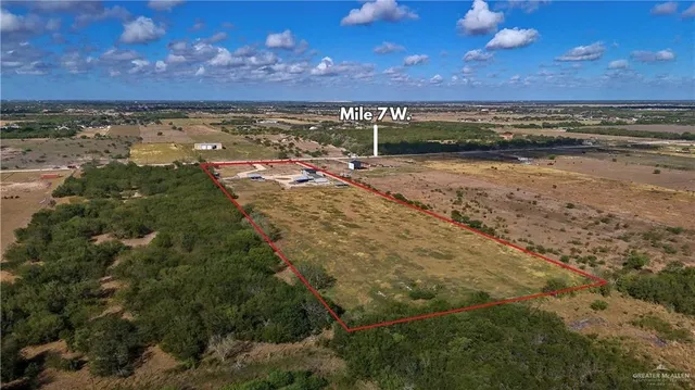 a view of a lake in middle of forest