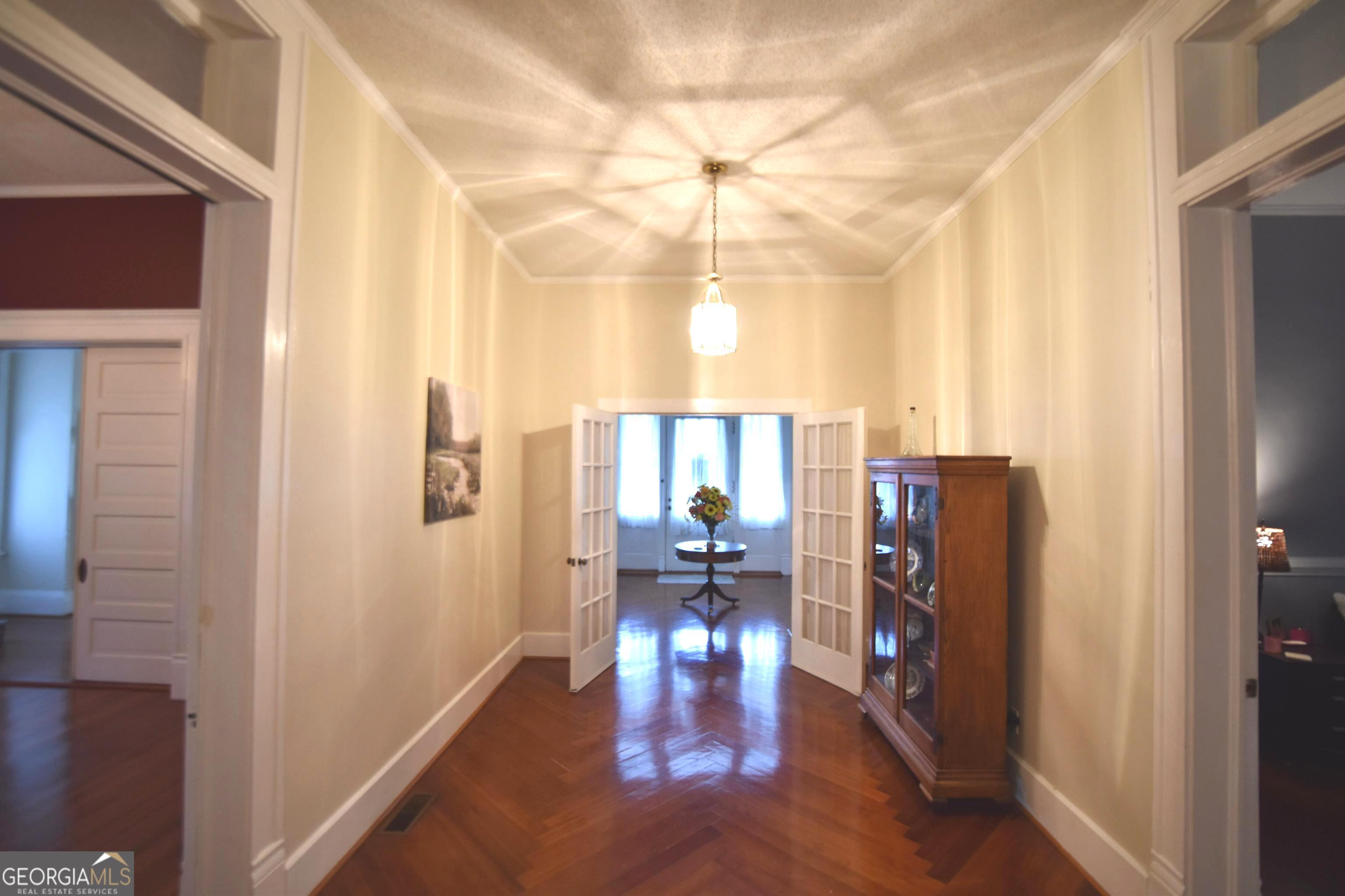 802 Mulberry Street Louisville, GA 30434 - Photo 13 of 51 a view of living room with furniture and a window