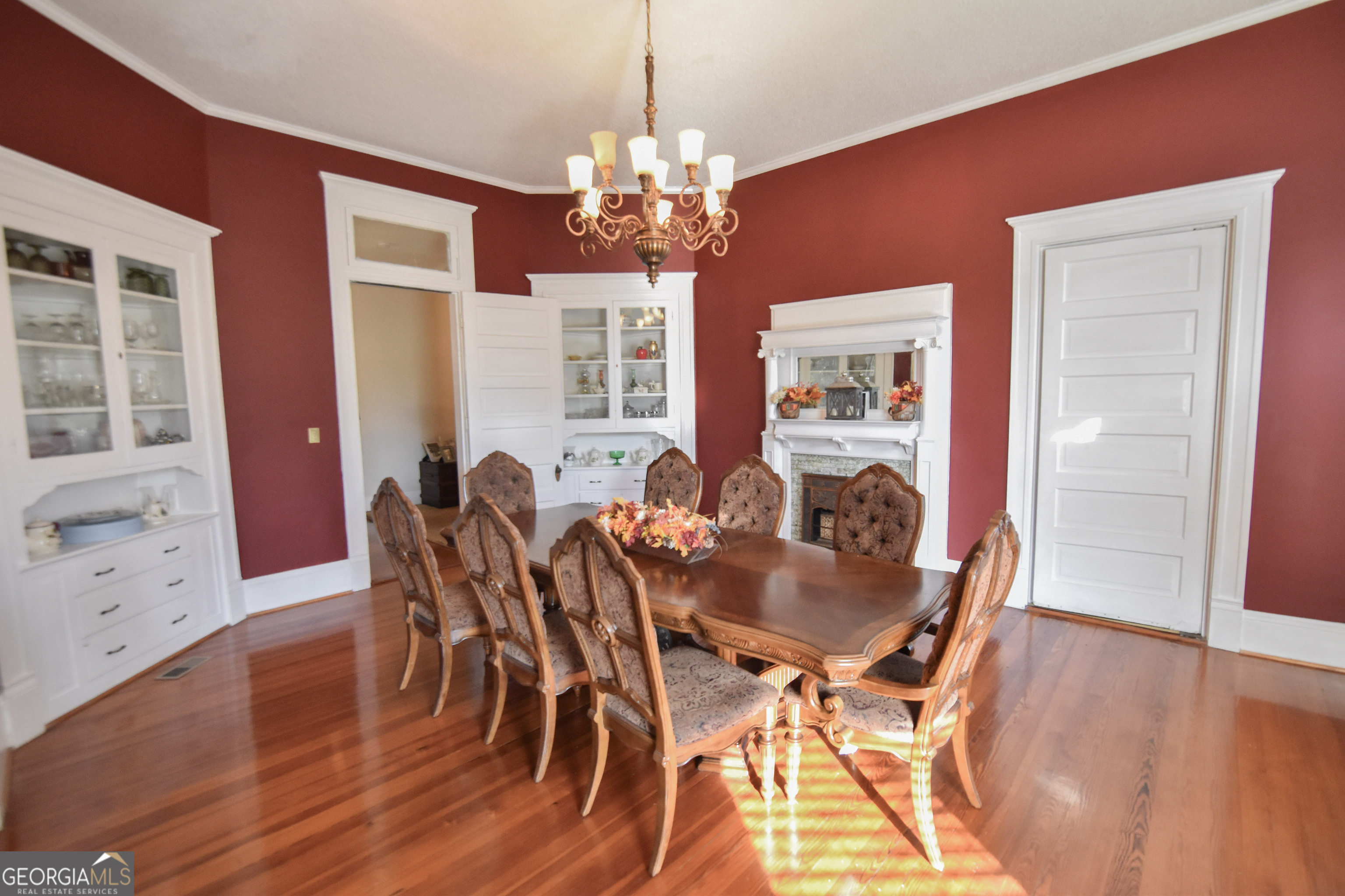 802 Mulberry Street Louisville, GA 30434 - Photo 18 of 51 a view of a dining room with furniture and wooden floor