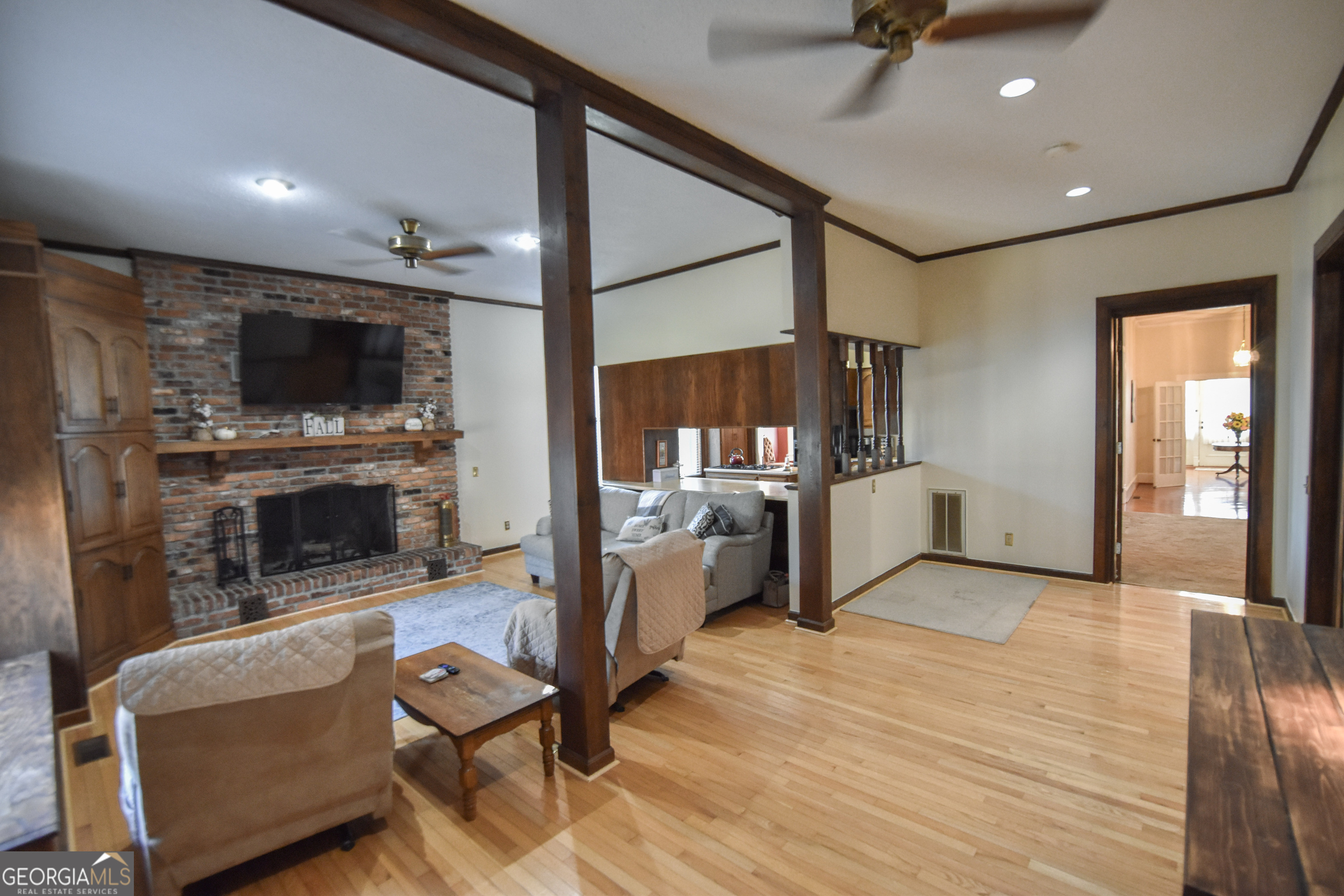 802 Mulberry Street Louisville, GA 30434 - Photo 33 of 51 a living room with furniture and a flat screen tv