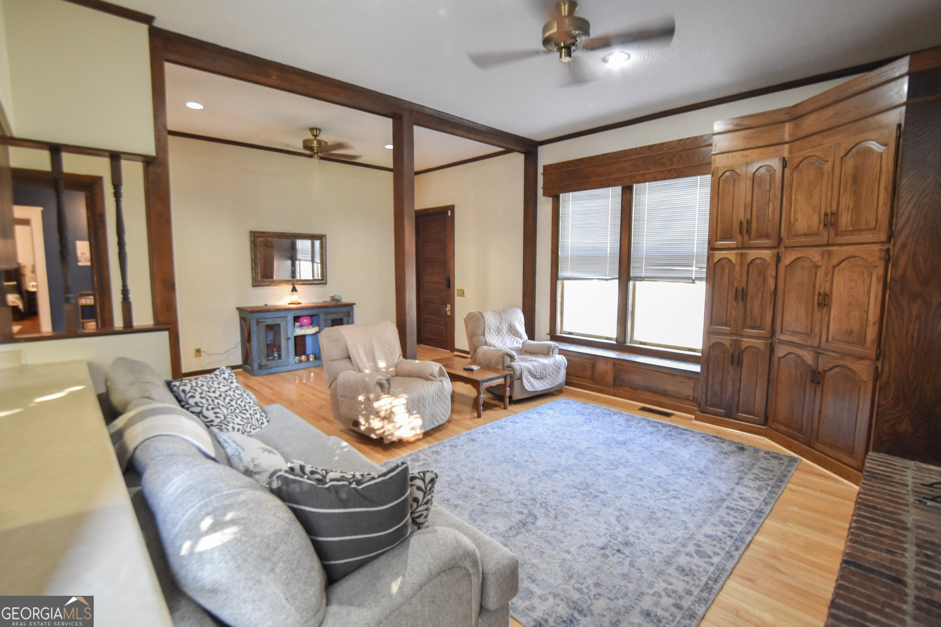 802 Mulberry Street Louisville, GA 30434 - Photo 36 of 51 a living room with furniture and a window