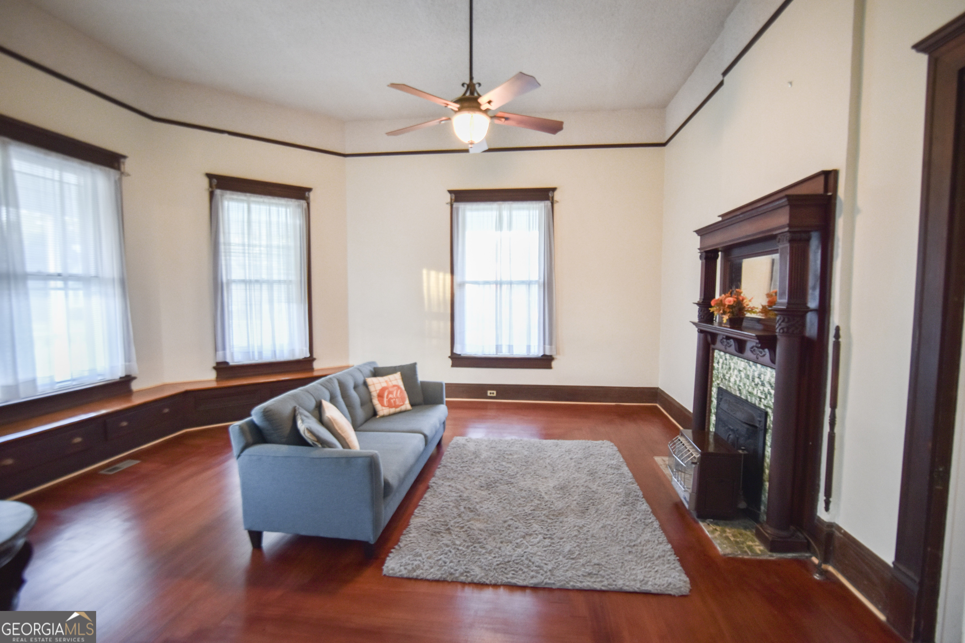802 Mulberry Street Louisville, GA 30434 - Photo 7 of 51 a living room with furniture and a window