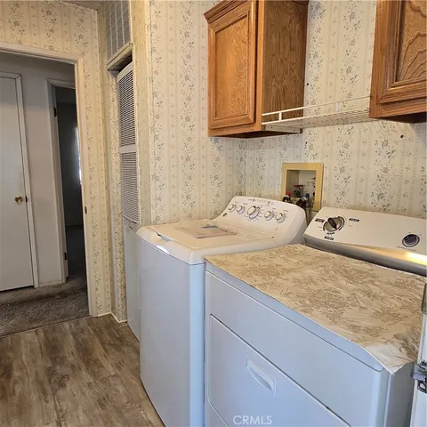 a view of an empty room with empty shelves