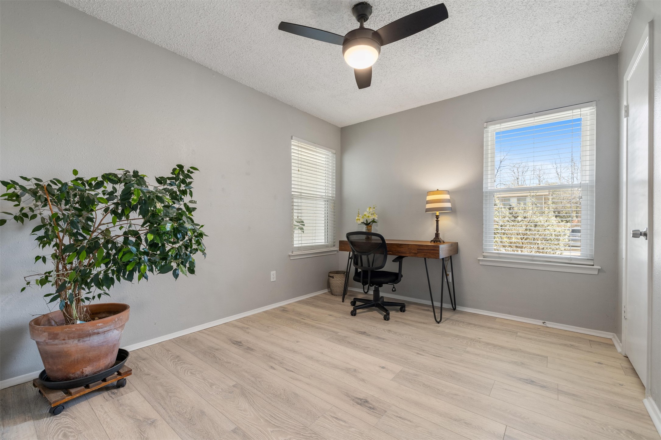 11302 Windermere Meadows Austin, TX 78759 - Photo 16 of 26 a view of work space with furniture and a window