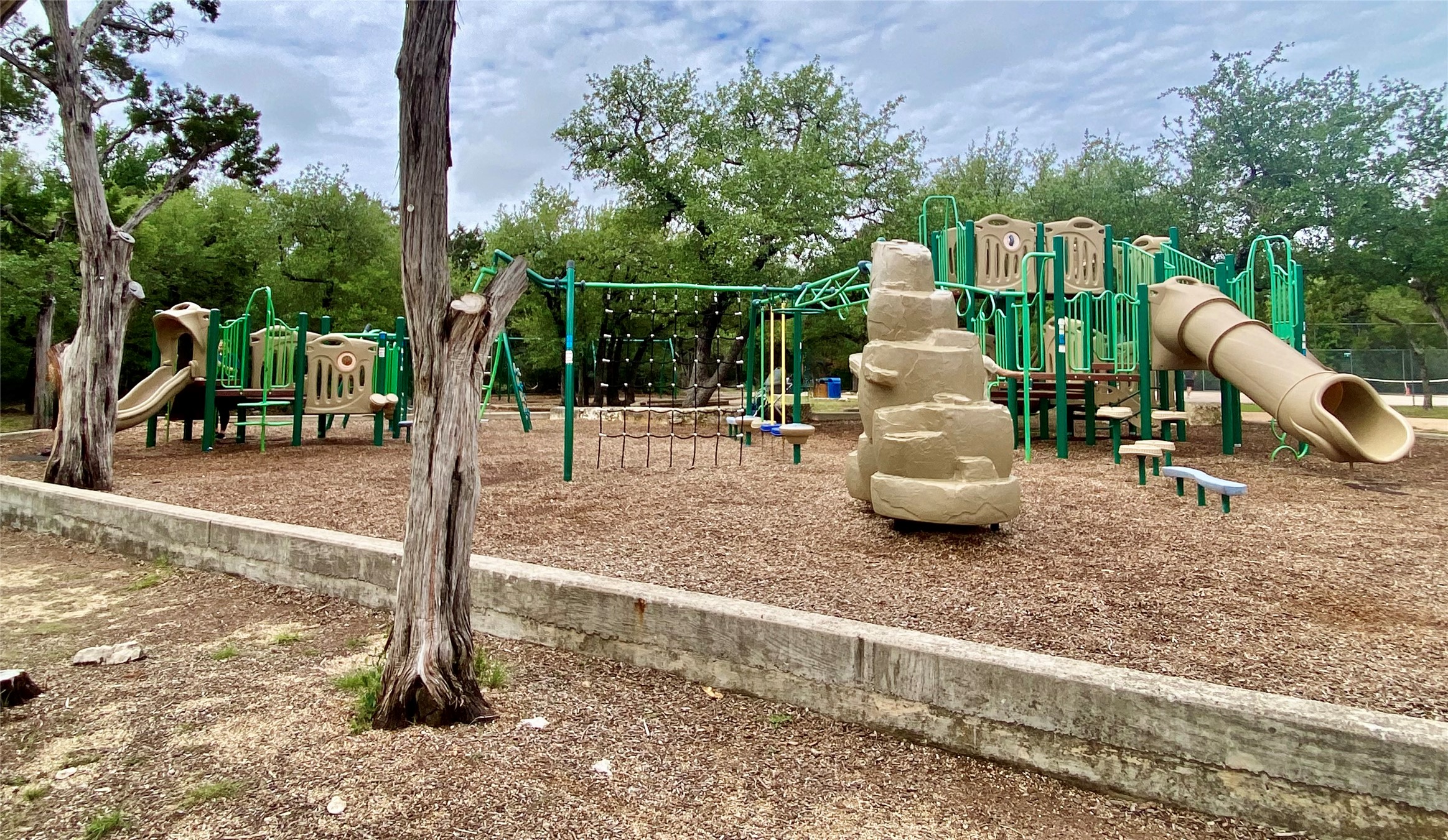 11302 Windermere Meadows Austin, TX 78759 - Photo 22 of 26 a white bench sitting in front of a house